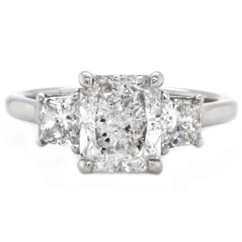 Platinum Three-Stone 1.52 Ct. Radiant Cut Center Diamond with 0.72 Ct. Trapezoid Side Diamonds Engagement Ring