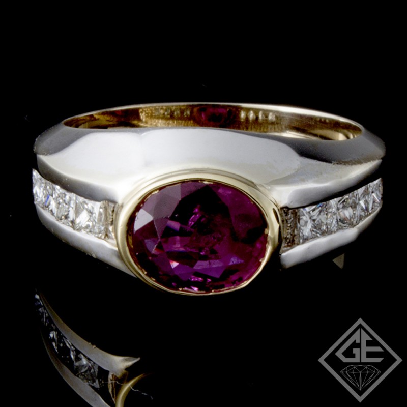 Ladies Antique Style Fashion Ring with 1.50 carats Oval Cut Ruby and 0.48 carats Princess Cut Diamonds in Channel setting 14k 2-tone Gold