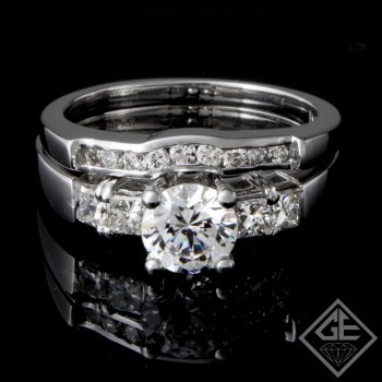 Ladies Diamond Bridal set Ring with 0.66 carat Round Brilliant and Princess cut side diamonds